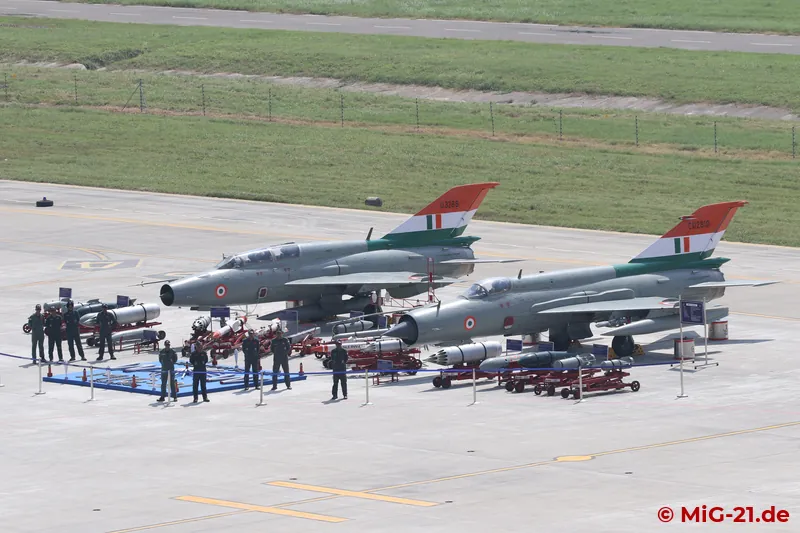 Waiting for the rush of visitors. A MiG-21UM and a MiG-21 Bison were each displayed in front of the …