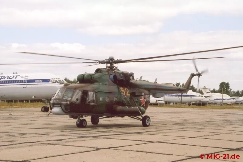 ... followed by Mi-8 and Mi-17 (seen here) dropping parachutists, ...