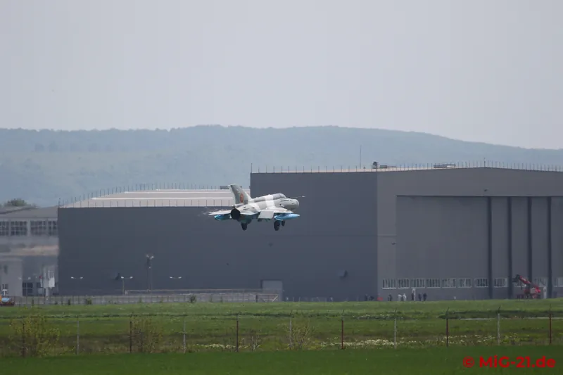 ... and touches down near the hangars it had left only a few months earlier.