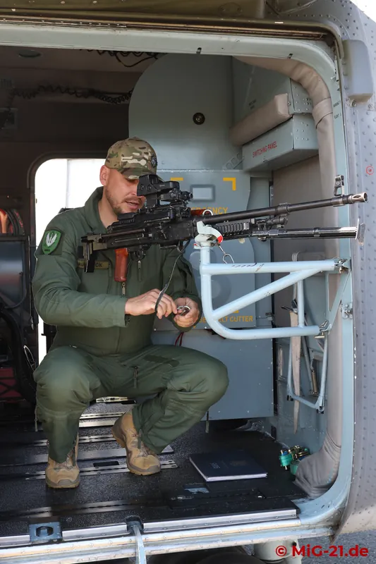 ... and a PK machine gun in the right door of a Mi-171Sh.
