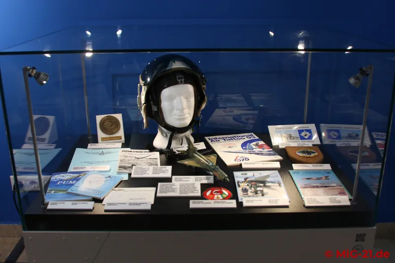 Further exhibits relating to the MiG-21 can be found in the exhibition rooms, such as a GSh-3 pilot's helmet, …