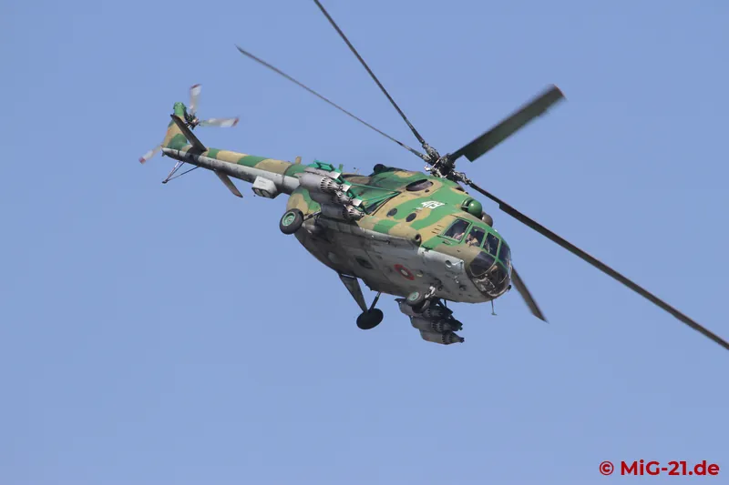 Under the protection of an armed Mi-17 ...