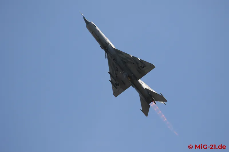 ... the MiG-21 manoeuvres over the airfield ...