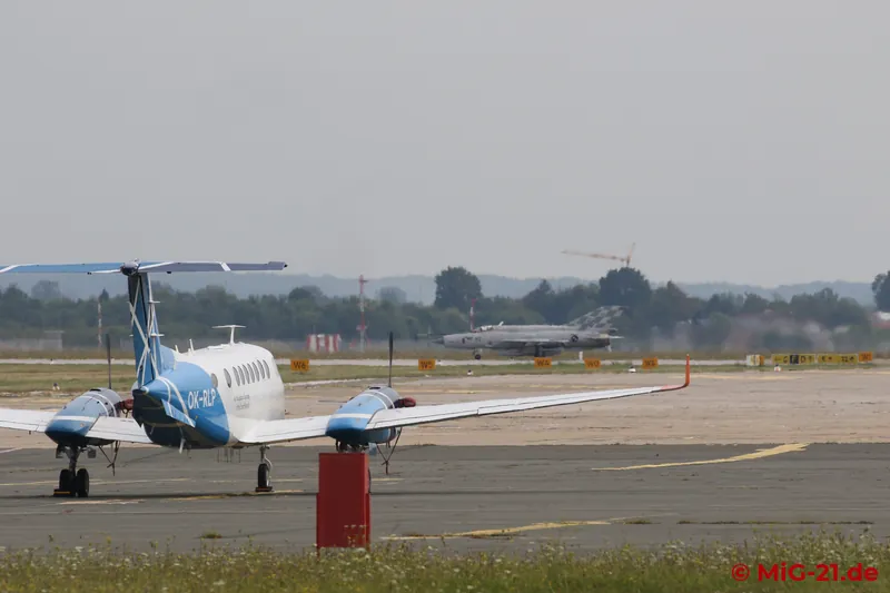 Then at last the message from the other side of the fence: VITEZ 10 (the MiG's call sign) has checked in. A …