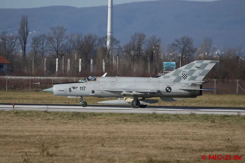 Both line up on the runway, ...
