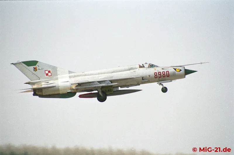 Many of the MiG-21s based at Gdynia carried, besides the squadron badge on the fin, striking bird-of-prey …