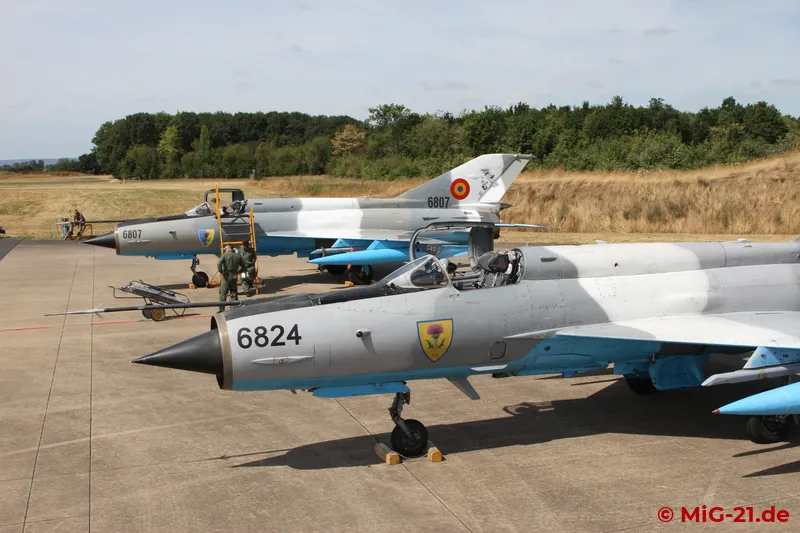 While the pilots completed their aircraft documents ...