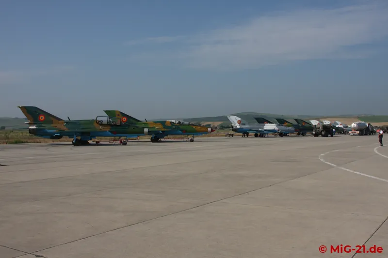 Preparation: eight aircraft stand on the flightline, ...