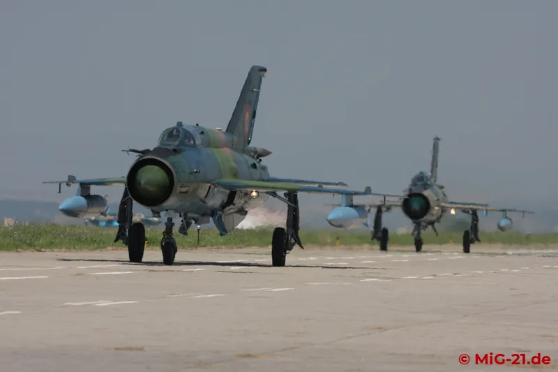After landing, all aircraft taxi to the hangar apron, ...