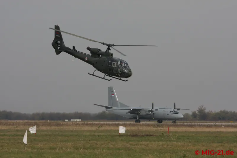 While a Gazelle flew circuits on one side of the base, the An-26 circled on the other.