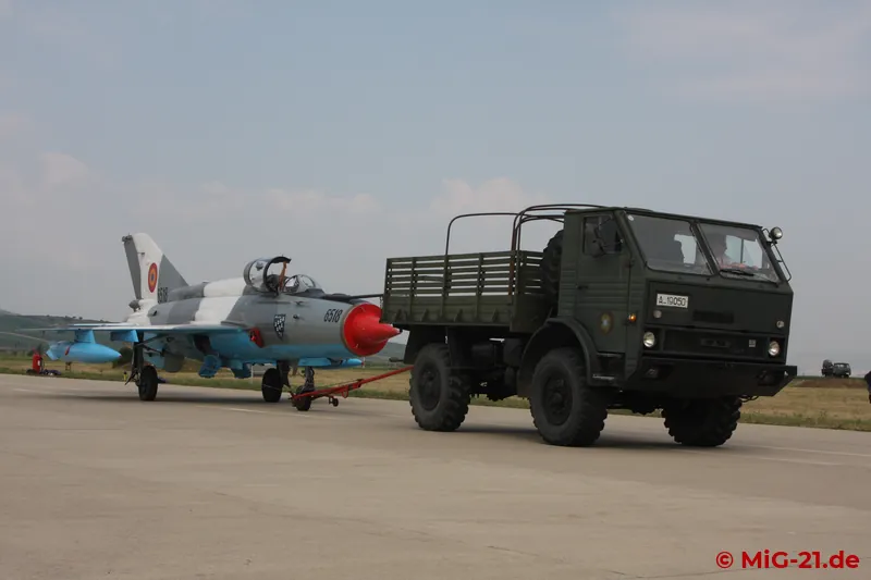 Towing for flight preparation. The DAC tractor is a Romanian speciality.