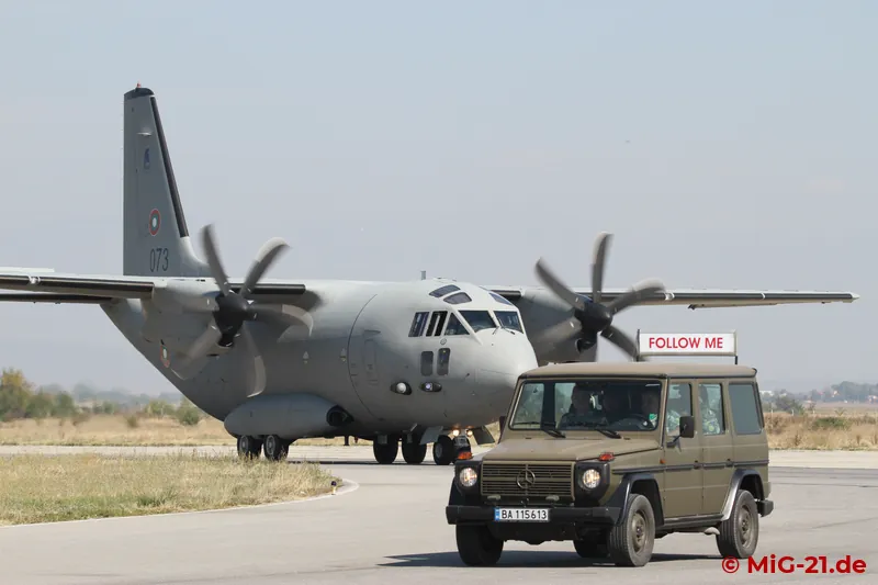 While the aircraft was escorted to its parking position by military police, ...