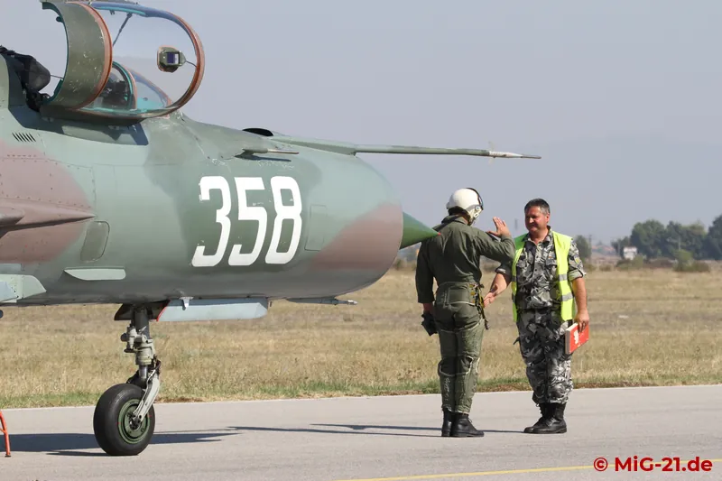 ... where, after a proper report, the pilots handed out presents to the children and signed autographs.