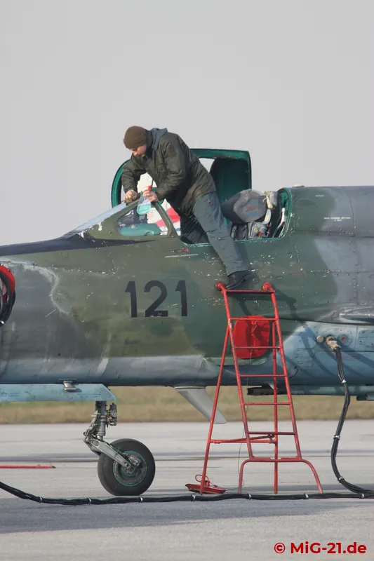 Preparing for the flying display: window cleaning on the MiG-21.