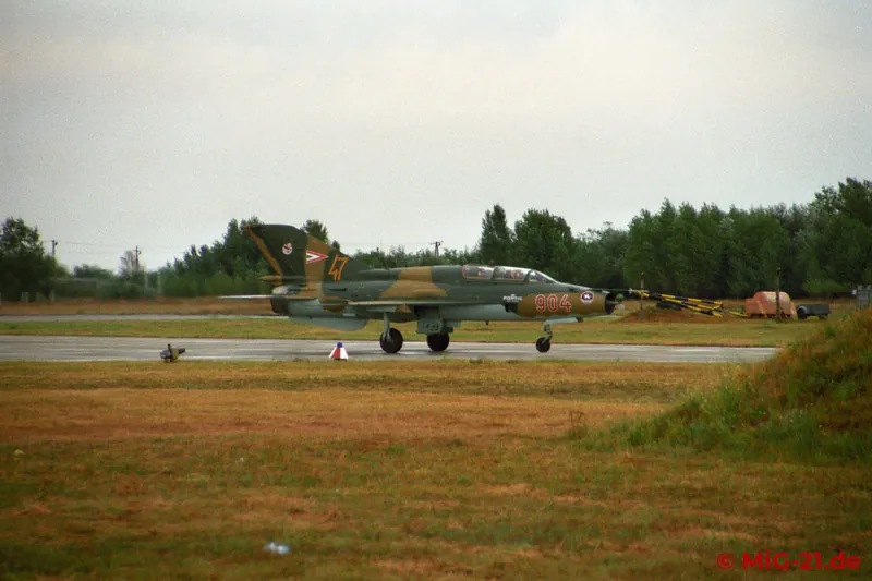 ... and taxies over a wet runway.