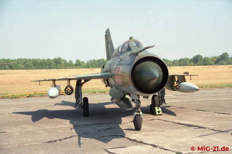 ... a single MiG-21MF with external stores ...